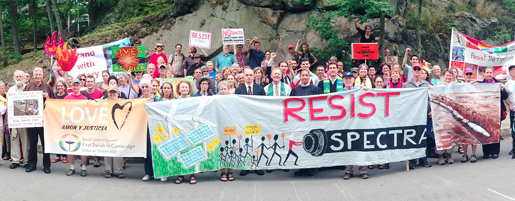 Photo by Peter Bowden. Image shows a large, interfaith gathering in resistance to the West Roxbury Lateral Pipeline.